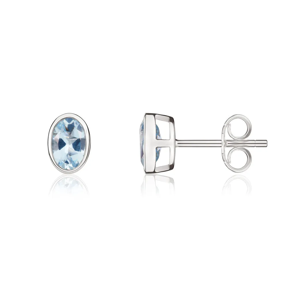 9ct White Gold Aquamarine 6x4mm Oval Rub Over Set Stud Earrings