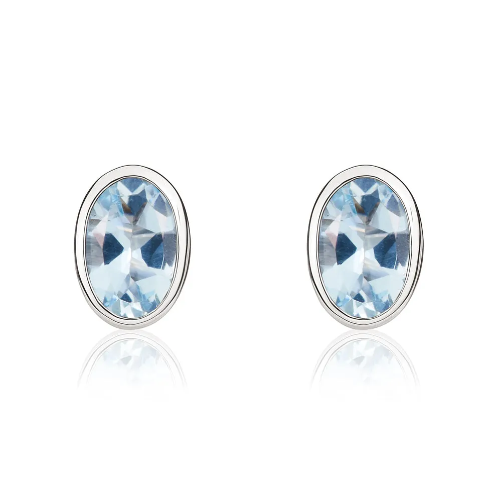 9ct White Gold Aquamarine 6x4mm Oval Rub Over Set Stud Earrings