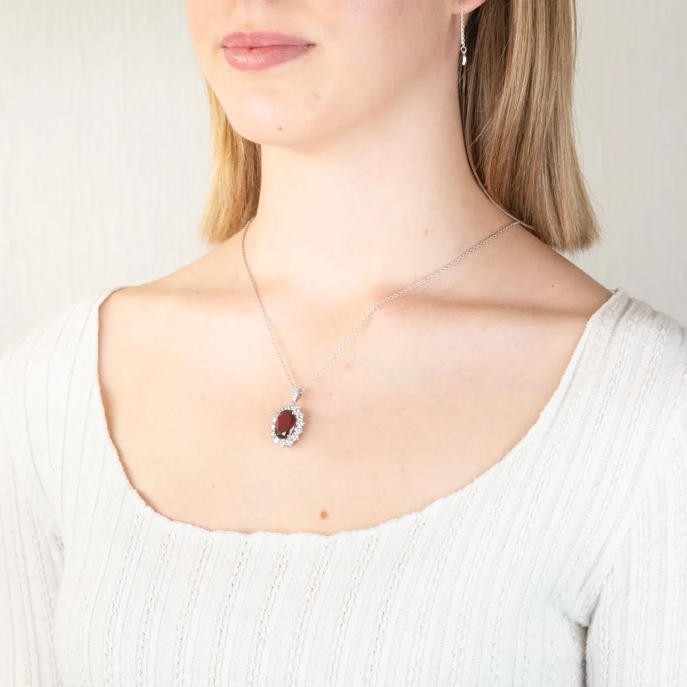 Sterling Silver Rhodium Plated Oval Red Stone Cubic Zirconia Pendant With 45cm Chain Shiels